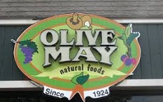 Olive May Health Foods logo
